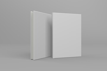 Realistic 3D book mockup illustration with 2 hard covers. Book model standing upright on isolated gray background with shadow. 2 hardcover books. Ready for you to present your design.