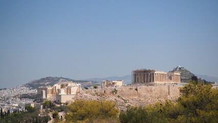 Acropolis with Parthenon and the Herodion theatre. View from the hill of Philopappou, Athens,...