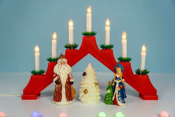 Santa Claus, Snow Maiden and Christmas tree. Celebrating the New Year