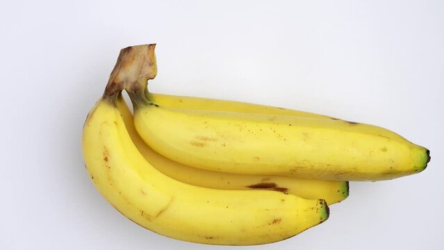 Banana comb on white rotated..