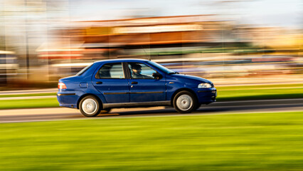 22 april 2023.Bialystok.Poland.Paning shot -car in motion with a blurred background.
