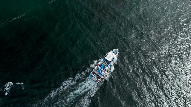 Aerial 4K drone footage of Doolin Pier in Ireland with ferries summer