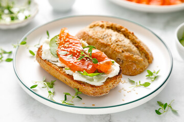 Salmon salted sandwich with spinach and cream cheese