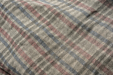 The texture of the cloth has a pattern of alternating colors. On a beautiful cloth background image