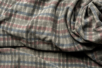 The texture of the cloth has a pattern of alternating colors. On a beautiful cloth background image