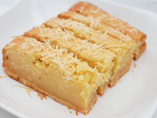 cassava tapai cake with cheese topping, indonesian food
