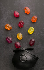 scattered candies from a witch's bucket-cauldron