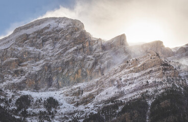 snow covered mountains with clouds 
