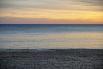 Sunset on the beach with layers of colors 