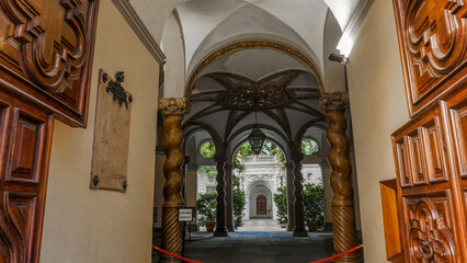 A view of the entrance of an ancient building in Turin, Italy.