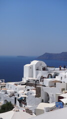 Beautiful Oia town on Santorini island, Greece. Traditional white architecture  and greek orthodox...