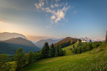 Panoramic view of Sveti Duh (St. Spirit) church under mountain Olseva in Kamnik-Savinja Alps, Slovenia