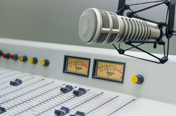 Professional microphone and sound mixer in radio station studio
