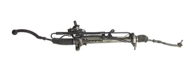 Spare part of the car steering rack new in plastic packaging for turning the wheels close-up on the floor of the tile to perform vehicle maintenance in auto service.