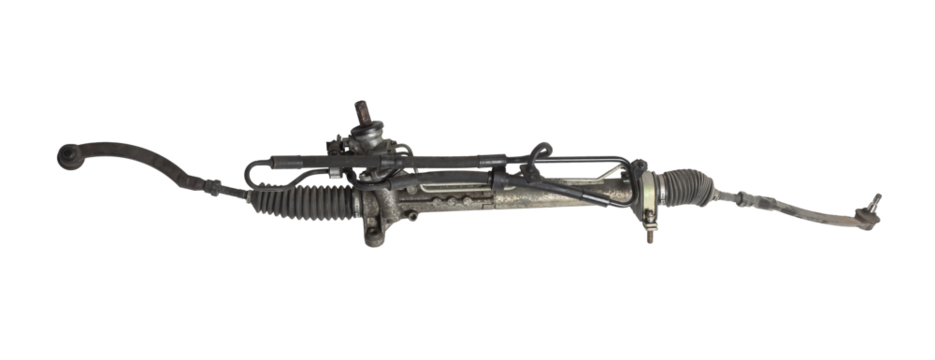 Spare part of the car steering rack new in plastic packaging for turning the wheels close-up on the floor of the tile to perform vehicle maintenance in auto service.