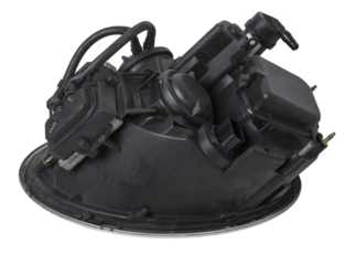 Stylish xenon headlight of a German car - optical equipment with a lamp inside on a white isolated background. Spare part for auto repair in a car workshop.