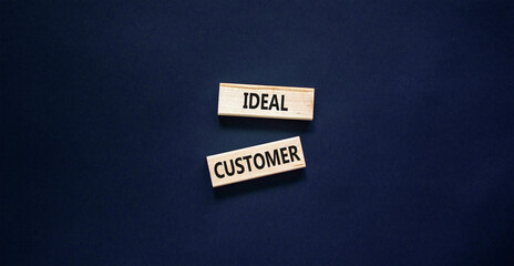 Ideal customer symbol. Concept words Ideal customer on beautiful wooden blocks. Beautiful black table black background. Business ideal customer concept. Copy space.
