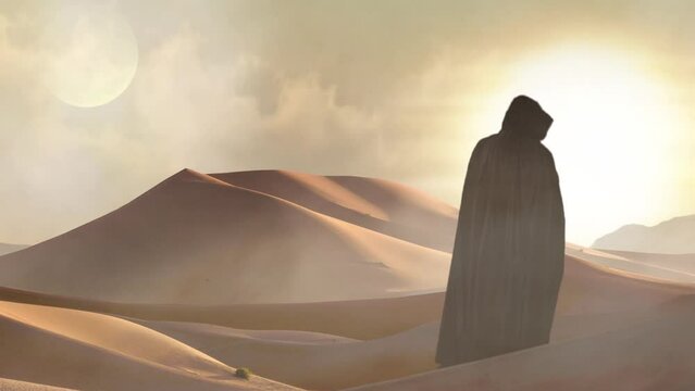 Black Cloaked Figure with Sword in Desert 4K features a man in a black hooded cloak turning toward the viewer with a sword in hand standing in a desert with blowing sand and dust.