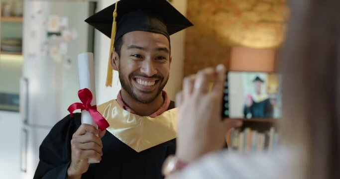 Graduation, camera and excited with a man student in his home, posing for an education ceremony event photograph. Smile, proud and a happy young male university or college graduate taking a picture