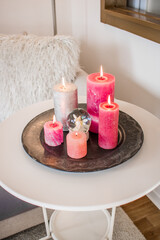 Obraz na płótnie Canvas Pink candles home decor interior design