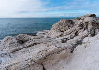 Fototapeta na wymiar Beautiful seascape with white rock formation on cloudy day. Beautiful landscape. Natural background.