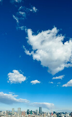 city skyline with clouds