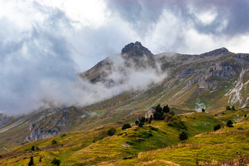 Fototapeta na wymiar clouds in the mountains of the north Caucasus