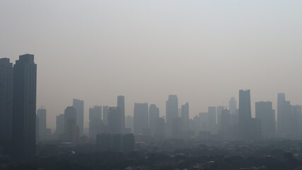 Fototapeta na wymiar Panoramic view of Jakarta city air pollution