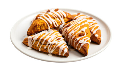 A Plate of Pumpkin Scones with Icing Isolated on a Transparent Background
