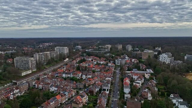 Brussels from above: Clouds cast shadows over a city rich in heritage and commerce.
