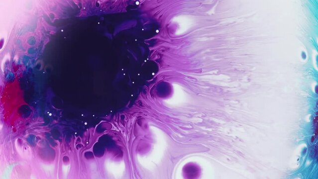 Color burst. Paint explosion. Pink purple ink splash on white rainbow liquid floating dynamic abstract art background.