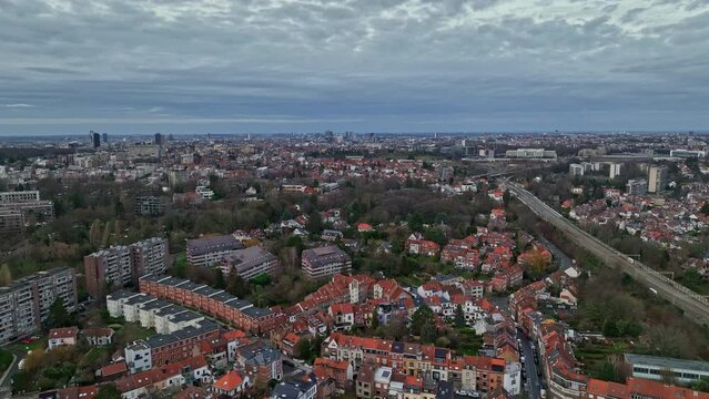 Gray skies highlight Brussels' urban tapestry: a blend of history, homes, and hubs.
