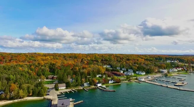 The shore of Lake Michigan by the Anderson Dock Ephraim Door County Wisconsin on a sunny day drone footage