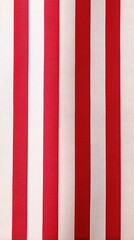 Fototapeta na wymiar red and white striped fabric texture background