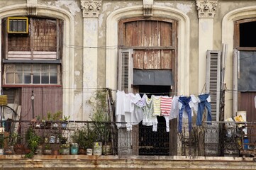 Loundry on the building balcony Cuba Havana streets - obrazy, fototapety, plakaty