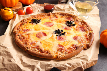 Tasty pizza for Halloween celebration on table