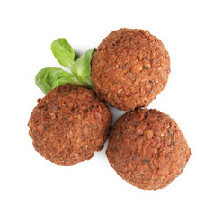 Delicious falafel balls and lambs lettuce on white background, top view. Vegan meat products