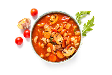 Bowl of tasty beef stew, fresh tomatoes and garlic on white background