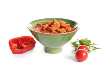 Bowl of tasty beef stew, tomatoes and bell pepper on white background