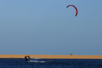 Grussai, RJ, Brazil, 08/19/2023 - Kitesurfer rides a board on a lagoon at Grussai Beach