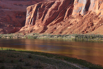Fototapeta na wymiar The brilliant colors of the Colorado river on the north half of Horseshoe Bend. Located just outside of Page, Arizona.