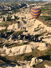 hot air balloons, in Cappadocia, Turkey, Cappadocia is a popular tourist destination.
