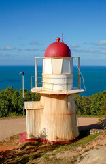 The lighthouse on grassy hill near the town of Cooktown, Cape York Peninsula , Queensland , Australia .