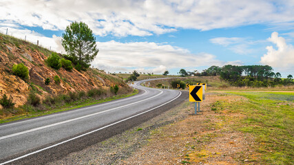 Winding road through Adelaide Hills during winter season, South Australia
