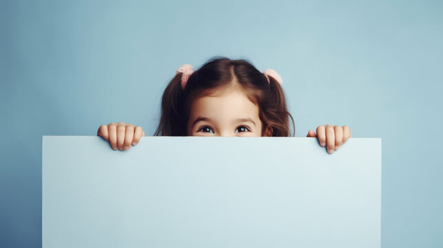 Child Holding A Blank Sign