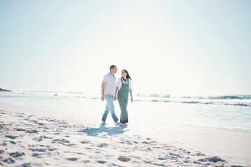 Beach, happy couple or walking while holding hands on vacation, care or bonding in summer mockup space. Man, woman or smile at ocean to travel, romance or support love in relationship together at sea