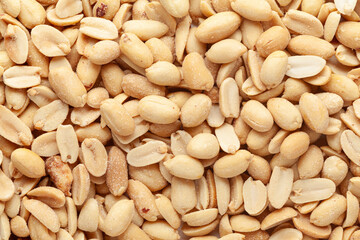 Crunchy roasted Peanuts, Indian namkeen (snacks) full-frame wallpaper. Top view.