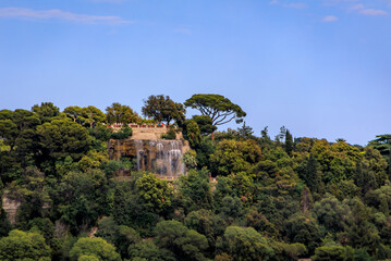 Fototapeta na wymiar Cascading waterfall atop Castle Hill or Colline du Chateau at the park in Nice, tourist landmark of French Riviera, South of France