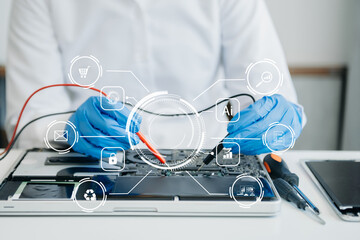 Electronics technician, electronic engineering electronic repair,electronics measuring and testing, repair and maintenance concepts.uses a voltage meter to check and upgrade in shop