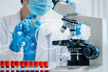 DNA molecule testing concepts. The doctor in a mask examines DNA molecules on the chemical...